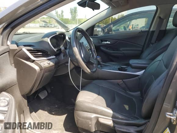 2017 Chevrolet Volt LT z VIN 1G1RA6S53HU169104, wystawiony jako Copart lot #49737903 z przebiegiem Nie podano mil oraz . Historia ofert i sprzedaży dostępna na DreamBid. Obrazek 7.