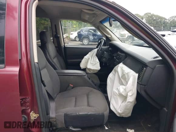 2002 Dodge Durango Sport with VIN 1B4HS38N32F206649, listed as a IAAI auction lot 40725627 with 290,822 mi miles and . Bid and sale history available at DreamBid. Image 5.