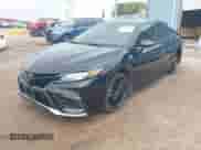 2023 Toyota Camry XSE with VIN 4T1K61AK4PU828838, listed as a IAAI auction lot 43087534 with 19,542 mi miles and . Bid and sale history available at DreamBid. Image 2.