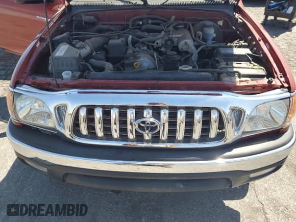 2002 Toyota Tacoma PreRunner z VIN 5TEGM92N62Z118802, wystawiony jako Copart lot #66684755 z przebiegiem 216 147 mil mil oraz Szkoda całkowita • Salvage title. Historia ofert i sprzedaży dostępna na DreamBid. Obrazek 11.