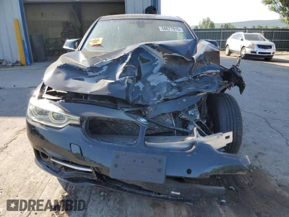 2017 BMW 3 Series 330i xDrive with VIN WBA8D9C33HA005231, listed as a Copart auction lot 68077915 with Not provided miles and Salvage title. Bid and sale history available at DreamBid. Image 5.