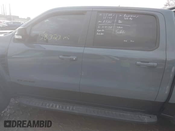 2021 Ram 1500 TRX with VIN 1C6SRFU97MN900193, listed as a IAAI auction lot 41050735 with 58,323 mi miles and . Bid and sale history available at DreamBid. Image 14.