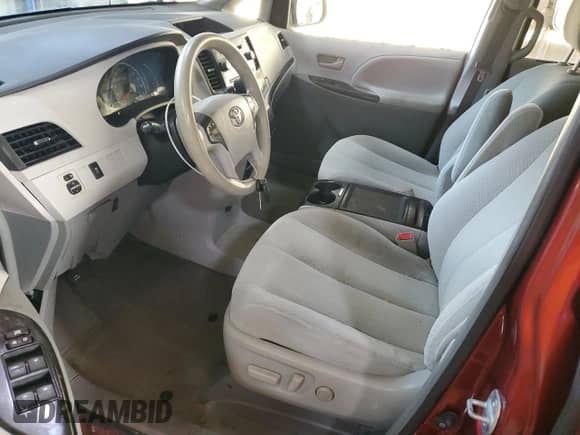 2014 Toyota Sienna LE with VIN 5TDKK3DC6ES518093, listed as a Copart auction lot 85151965 with 104,918 mi miles and Salvage title. Bid and sale history available at DreamBid. Image 7.