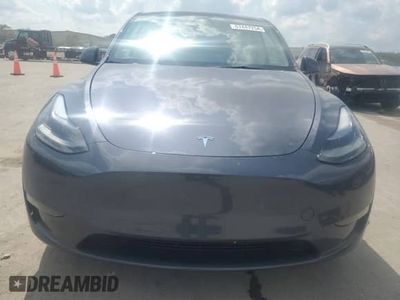 2023 Tesla Model Y with VIN 7SAYGDED6PF960648, listed as a Copart auction lot 67447254 with 18,536 mi miles and Salvage title. Bid and sale history available at DreamBid. Image 5.