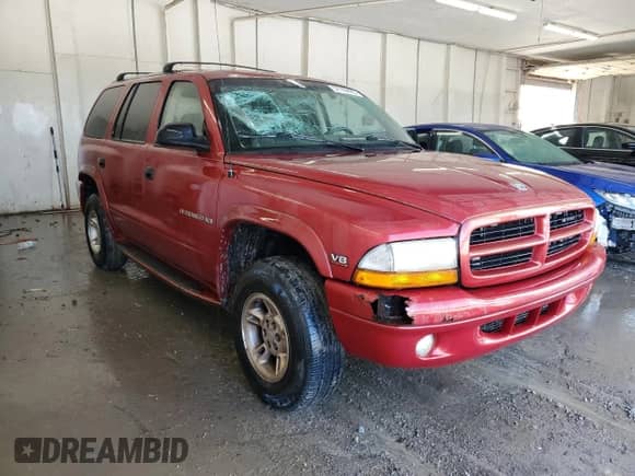 1998 Dodge Durango with VIN 1B4HS28Y5WF100889, listed as a Copart auction lot 57709425 with 261,895 mi miles and Salvage title. Bid and sale history available at DreamBid. Image 4.