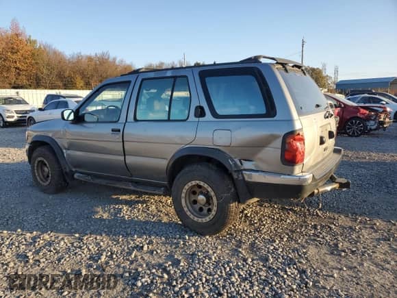 1999 Nissan Pathfinder XE with VIN JN8AR05Y4XW317915, listed as a Copart auction lot 82496174 with 301,862 mi miles and Salvage title. Bid and sale history available at DreamBid. Image 2.