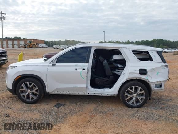2020 Hyundai Palisade SEL with VIN KM8R34HE1LU138001, listed as a IAAI auction lot 43252112 with 105,955 mi miles and . Bid and sale history available at DreamBid. Image 15.