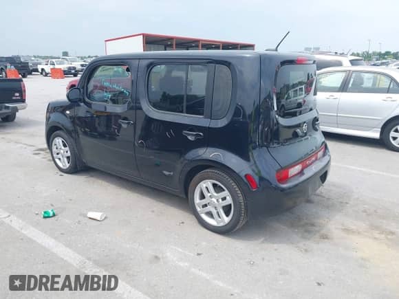 2013 Nissan Cube S with VIN JN8AZ2KR5DT302927, listed as a IAAI auction lot 42929094 with 159,374 mi miles and . Bid and sale history available at DreamBid. Image 3.