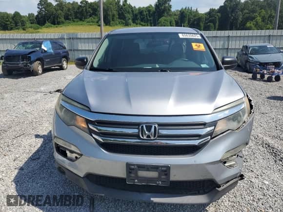 2016 Honda Pilot LX z VIN 5FNYF6H17GB024521, wystawiony jako Copart lot #65635625 z przebiegiem 168 863 mil mil oraz Szkoda całkowita • Salvage title. Historia ofert i sprzedaży dostępna na DreamBid. Obrazek 5.