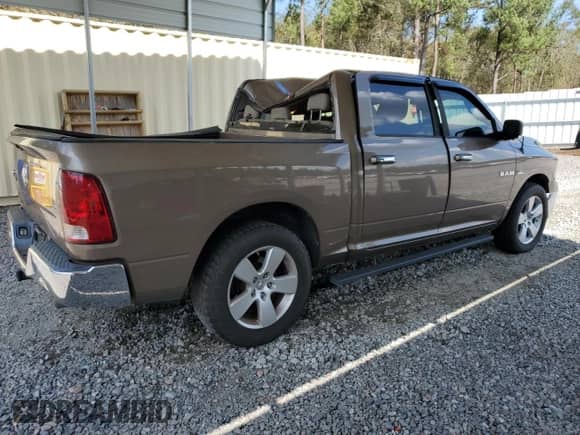 2009 Dodge 1500 SLT with VIN 1D3HB13T09S736549, listed as a Copart auction lot 73873824 with 176,610 mi miles and Salvage title. Bid and sale history available at DreamBid. Image 3.