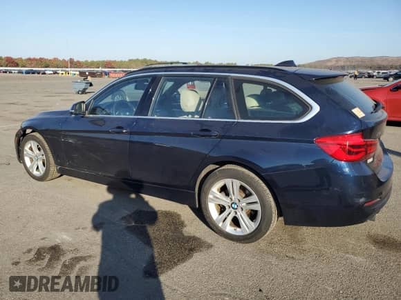 2016 BMW 3 Series 328d xDrive with VIN WBA8J1C52GK458499, listed as a Copart auction lot 77224454 with 149,790 mi miles and Salvage title. Bid and sale history available at DreamBid. Image 2.