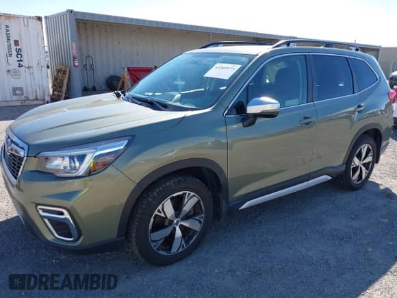 2020 Subaru Forester Touring with VIN JF2SKAXCXLH545932, listed as a IAAI auction lot 43305973 with 50,723 mi miles and . Bid and sale history available at DreamBid. Image 17.