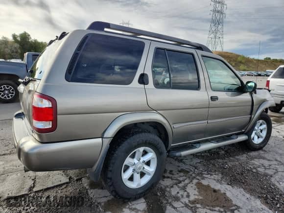 2003 Nissan Pathfinder LE с VIN JN8DR09Y93W835360, выставлен на аукционе Copart как лот 80575955 с пробегом 249 516 миль миль и Списание • Salvage title. История ставок и продаж доступна на DreamBid. Изображение 3.