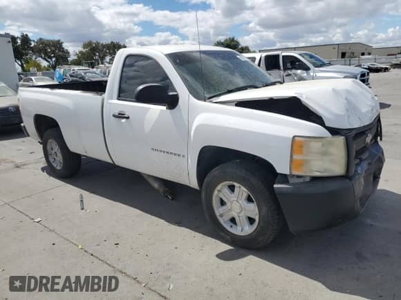 2007 Chevrolet Silverado 1500 Work Truck with VIN 1GCEC14C77E590220, listed as a Copart auction lot 80216565 with 183,667 mi miles and Salvage title. Bid and sale history available at DreamBid. Image 4.