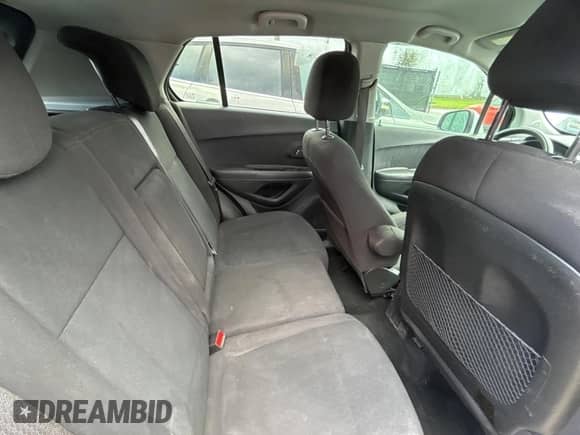 2020 Chevrolet Trax LS с VIN KL7CJKSB7LB052283, выставлен на аукционе Copart как лот 84976815 с пробегом 70 819 миль миль и Чистый • Clean title. История ставок и продаж доступна на DreamBid. Изображение 6.
