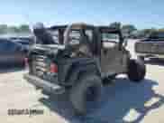 2001 Jeep Wrangler Sahara z VIN 1J4FA59S61P352141, wystawiony jako Copart lot #66212355 z przebiegiem Nie podano mil oraz Czysty tytuł • Clean title. Historia ofert i sprzedaży dostępna na DreamBid. Obrazek 3.