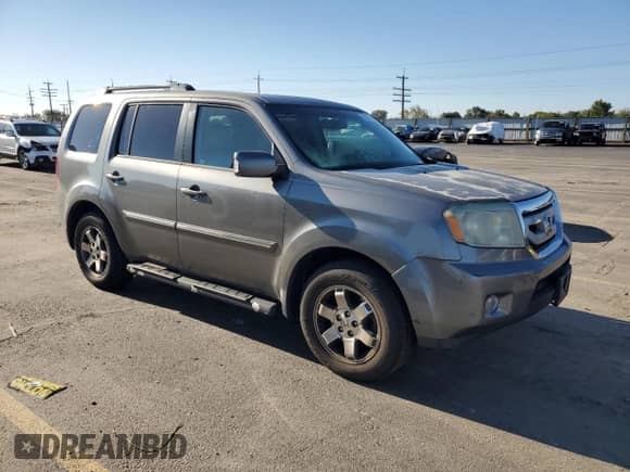 2009 Honda Pilot Touring with VIN 5FNYF38809B003718, listed as a Copart auction lot 82214735 with 163,001 mi miles and Clean title. Bid and sale history available at DreamBid. Image 4.