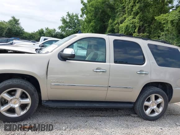 2012 Chevrolet Tahoe LTZ z VIN 1GNSKCE0XCR142165, wystawiony jako IAAI lot #42737217 z przebiegiem 167 857 mil mil oraz . Historia ofert i sprzedaży dostępna na DreamBid. Obrazek 15.