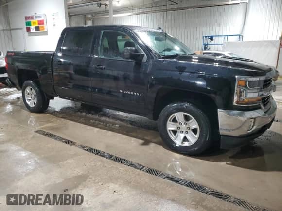 2018 Chevrolet Silverado 1500 LT z VIN 3GCUKREH8JG195454, wystawiony jako Copart lot #44555675 z przebiegiem 132 774 mil mil oraz Szkoda całkowita • Salvage title. Historia ofert i sprzedaży dostępna na DreamBid. Obrazek 4.