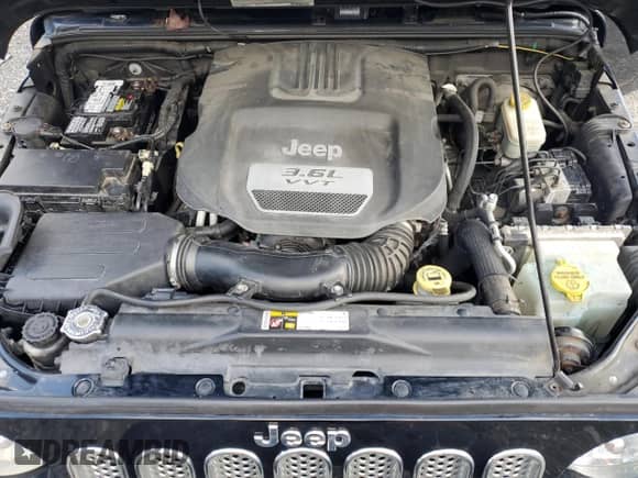 2012 Jeep Wrangler Sport with VIN 1C4AJWAG4CL237299, listed as a Copart auction lot 82743155 with 226,287 mi miles and Clean title. Bid and sale history available at DreamBid. Image 12.