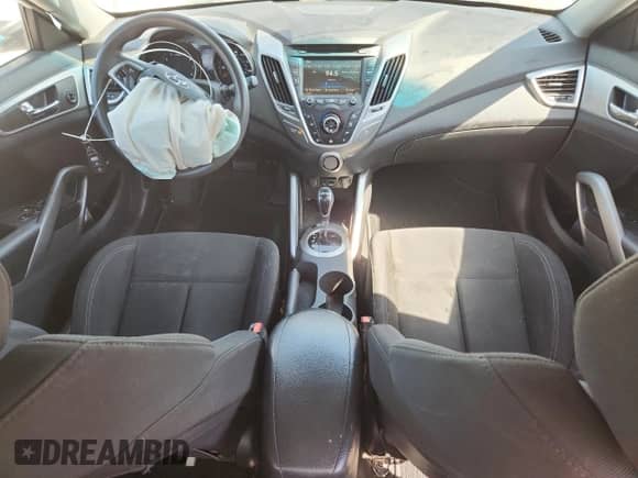 2013 Hyundai Veloster w/Gray Int z VIN KMHTC6AD4DU146162, wystawiony jako Copart lot #84929175 z przebiegiem 143 947 mil mil oraz Szkoda całkowita • Salvage title. Historia ofert i sprzedaży dostępna na DreamBid. Obrazek 8.