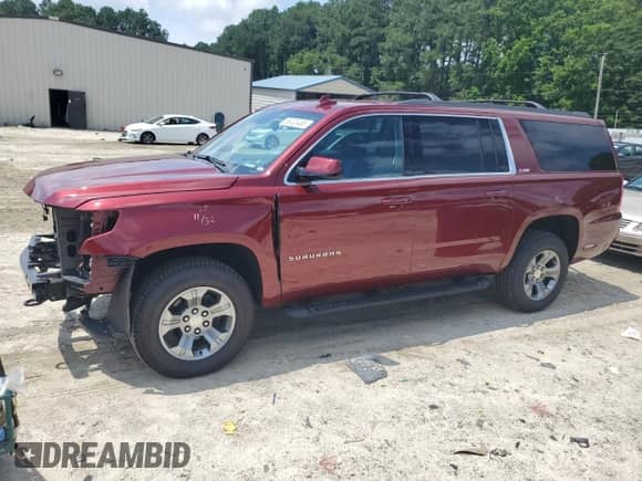 2020 Chevrolet Suburban LT with VIN 1GNSKHKC2LR149820, listed as a Copart auction lot 65033485 with 100,854 mi miles and Salvage title. Bid and sale history available at DreamBid. Image 1.