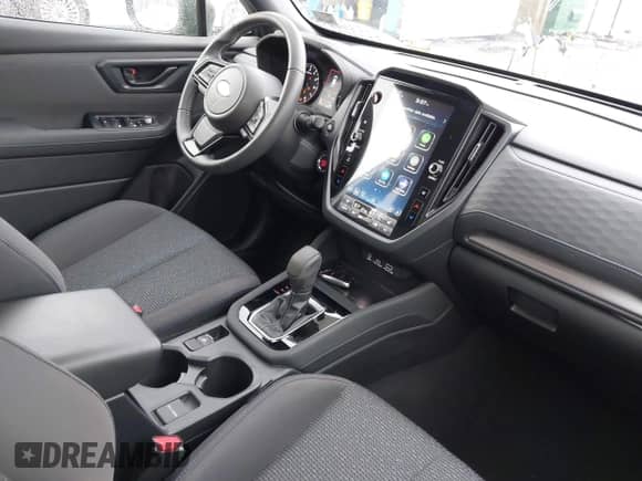 2025 Subaru Forester Premium z VIN JF2SLDDC2SH401843, wystawiony jako IAAI lot #43444577 z przebiegiem 12 857 mil mil oraz . Historia ofert i sprzedaży dostępna na DreamBid. Obrazek 5.