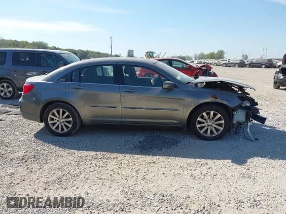 2013 Chrysler 200 Touring with VIN 1C3CCBBG0DN703489, listed as a IAAI auction lot 43361410 with 121,917 mi miles and . Bid and sale history available at DreamBid. Image 14.