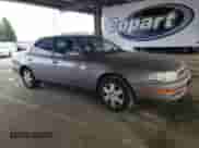 1992 Toyota Camry z VIN JT2VK12E3N0015025, wystawiony jako Copart lot #55521815 z przebiegiem 176 104 mil mil oraz Szkoda całkowita • Salvage title. Historia ofert i sprzedaży dostępna na DreamBid. Obrazek 4.