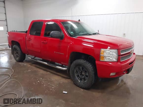 2013 Chevrolet Silverado 1500 LT with VIN 3GCPKSE72DG299308, listed as a IAAI auction lot 42831474 with 124,621 mi miles and . Bid and sale history available at DreamBid. Image 1.