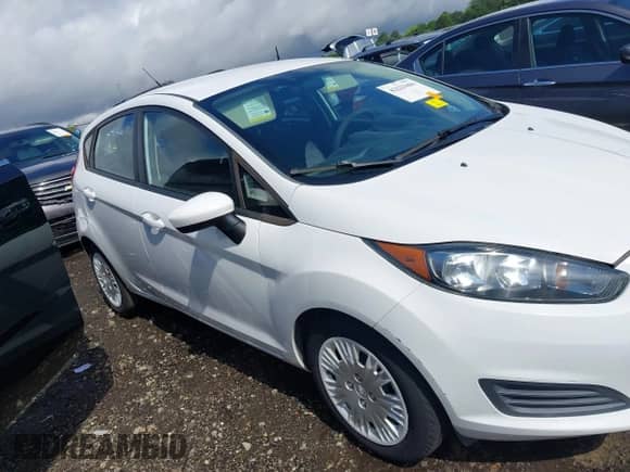 2015 Ford Fiesta S with VIN 3FADP4TJ8FM122710, listed as a IAAI auction lot 42223606 with 91,769 mi miles and . Bid and sale history available at DreamBid. Image 13.