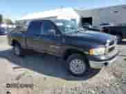 2004 Dodge 1500 SLT with VIN 1D7HU18D14S502018, listed as a Copart auction lot 72074895 with 143,545 mi miles and Salvage title. Bid and sale history available at DreamBid. Image 4.