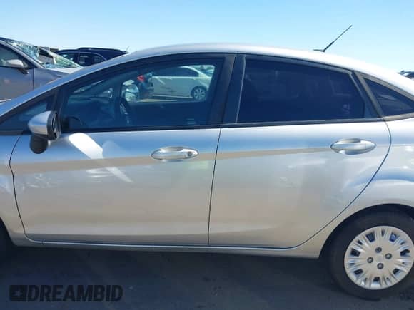 2015 Ford Fiesta S with VIN 3FADP4AJ6FM210934, listed as a IAAI auction lot 43434407 with 96,225 mi miles and . Bid and sale history available at DreamBid. Image 14.