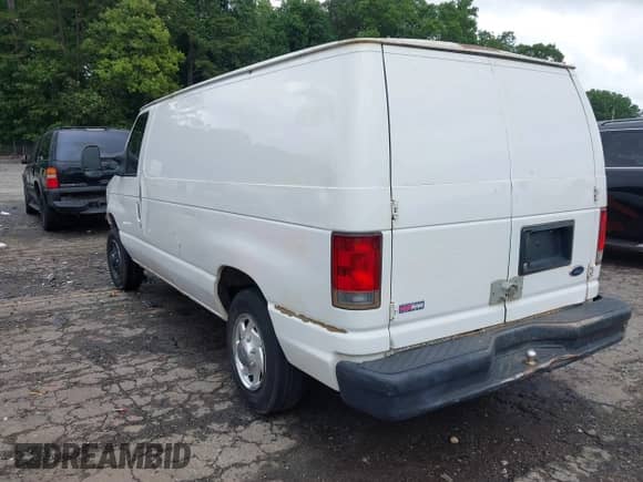 2011 Ford Econoline Cargo Commercial with VIN 1FTNE1EW6BDA82354, listed as a IAAI auction lot 42340908 with 312,950 mi miles and . Bid and sale history available at DreamBid. Image 3.
