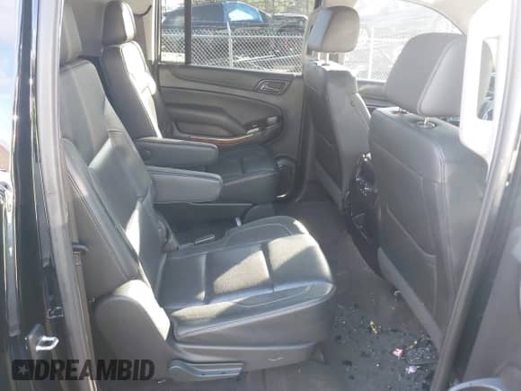 2019 Chevrolet Suburban Premier with VIN 1GNSKJKCXKR111502, listed as a IAAI auction lot 41075435 with 134,555 mi miles and . Bid and sale history available at DreamBid. Image 8.