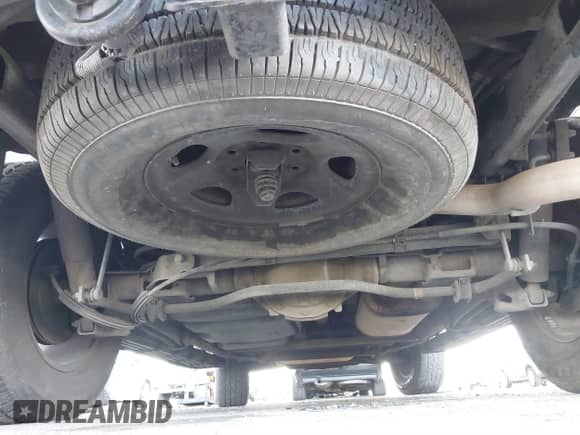 2003 Chevrolet Tahoe LS z VIN 1GNEC13T03J180708, wystawiony jako IAAI lot #41543671 z przebiegiem 203 442 mil mil oraz . Historia ofert i sprzedaży dostępna na DreamBid. Obrazek 14.