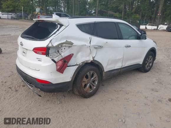 2014 Hyundai Santa Fe z VIN 5XYZUDLBXEG210414, wystawiony jako IAAI lot #43290355 z przebiegiem 132 888 mil mil oraz . Historia ofert i sprzedaży dostępna na DreamBid. Obrazek 4.