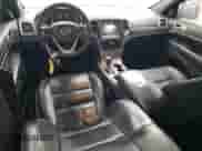 2016 Jeep Grand Cherokee High Altitude with VIN 1C4RJECG4GC314575, listed as a Copart auction lot 84265744 with 129,144 mi miles and Salvage title. Bid and sale history available at DreamBid. Image 8.