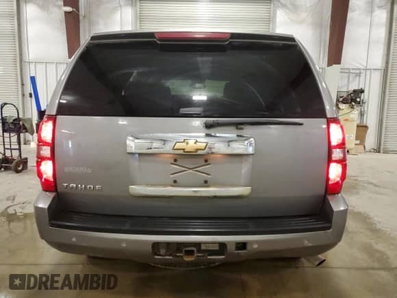 2007 Chevrolet Tahoe LS with VIN 1GNFK13017J165573, listed as a Copart auction lot 57634325 with 231,055 mi miles and Salvage title. Bid and sale history available at DreamBid. Image 6.
