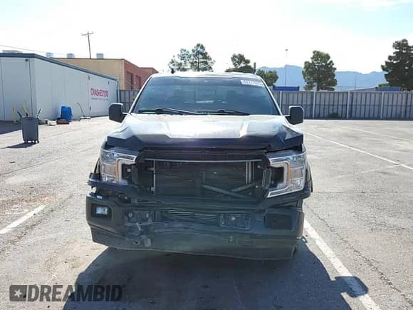 2020 Ford F-150 XL with VIN 1FTEW1E44LKD60628, listed as a Copart auction lot 62777675 with 96,121 mi miles and Salvage title. Bid and sale history available at DreamBid. Image 14.