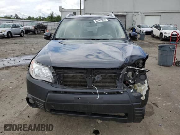 2011 Subaru Forester z VIN JF2SHBHC7BH719649, wystawiony jako Copart lot #57782065 z przebiegiem 241 157 mil mil oraz Szkoda całkowita • Salvage title. Historia ofert i sprzedaży dostępna na DreamBid. Obrazek 5.