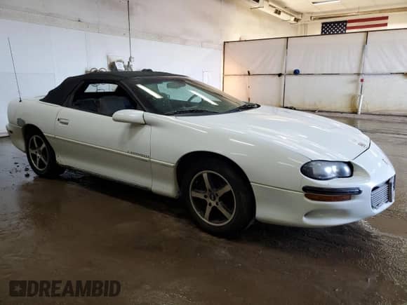 2000 Chevrolet Camaro z VIN 2G1FP32K3Y2148572, wystawiony jako Copart lot #43952864 z przebiegiem Nie podano mil oraz Szkoda całkowita • Salvage title. Historia ofert i sprzedaży dostępna na DreamBid. Obrazek 4.