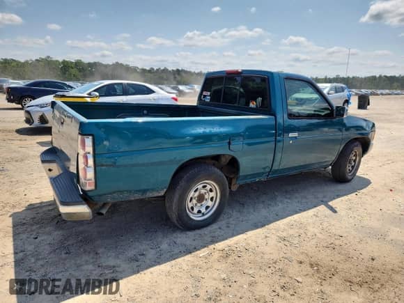 1995 Nissan Frontier with VIN 1N6SD11S3SC358078, listed as a Copart auction lot 71859815 with 118,833 mi miles and Salvage title. Bid and sale history available at DreamBid. Image 3.