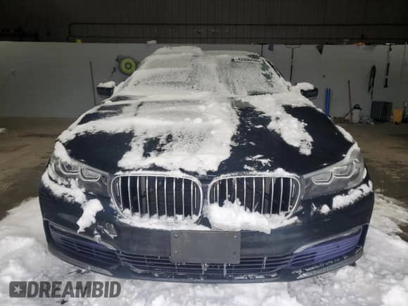 2017 BMW 7 Series 740i xDrive with VIN WBA7E4C55HGU99781, listed as a Copart auction lot 42806505 with 74,825 mi miles and Salvage title. Bid and sale history available at DreamBid. Image 5.