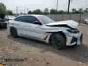 2023 BMW i4 M50 with VIN WBY33AW03PFR26660, listed as a Copart auction lot 60793705 with 44,753 mi miles and Salvage title. Bid and sale history available at DreamBid. Image 4.