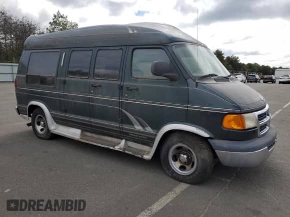1999 Dodge Cargo Conversion with VIN 2B6HB11Y0XK505623, listed as a Copart auction lot 71873994 with 69,806 mi miles and Non repairable. Bid and sale history available at DreamBid. Image 4.