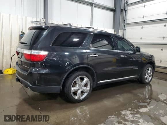 2012 Dodge Durango Citadel with VIN 1C4SDJET7CC301941, listed as a Copart auction lot 68397715 with 157,235 mi miles and Salvage title. Bid and sale history available at DreamBid. Image 3.