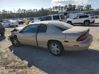 1998 Chevrolet Monte Carlo LS z VIN 2G1WW12M0W9214010, wystawiony jako Copart lot #76815584 z przebiegiem 59 074 mil mil oraz Szkoda całkowita • Salvage title. Historia ofert i sprzedaży dostępna na DreamBid. Obrazek 2.