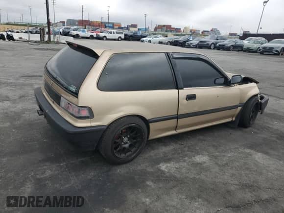 1990 Honda Civic with VIN 2HGED6343LH555344, listed as a Copart auction lot 51232765 with 217,533 mi miles and Salvage title. Bid and sale history available at DreamBid. Image 3.