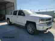 2017 Chevrolet Silverado 1500 High Country с VIN 3GCUKTEJXHG216945, выставлен на аукционе Copart как лот 85794395 с пробегом 129 032 миль миль и Списание • Salvage title. История ставок и продаж доступна на DreamBid. Изображение 13.